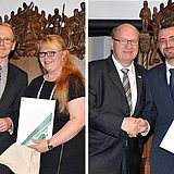 Personen halten ein Dokument in der Hand und stehen nebeneinander